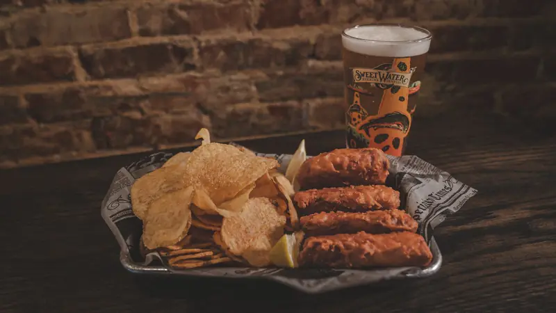 Fish and chips with a pint of SweetWater